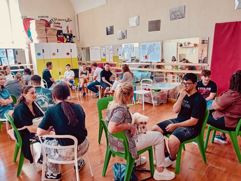 ragazzi e genitori in cerchio